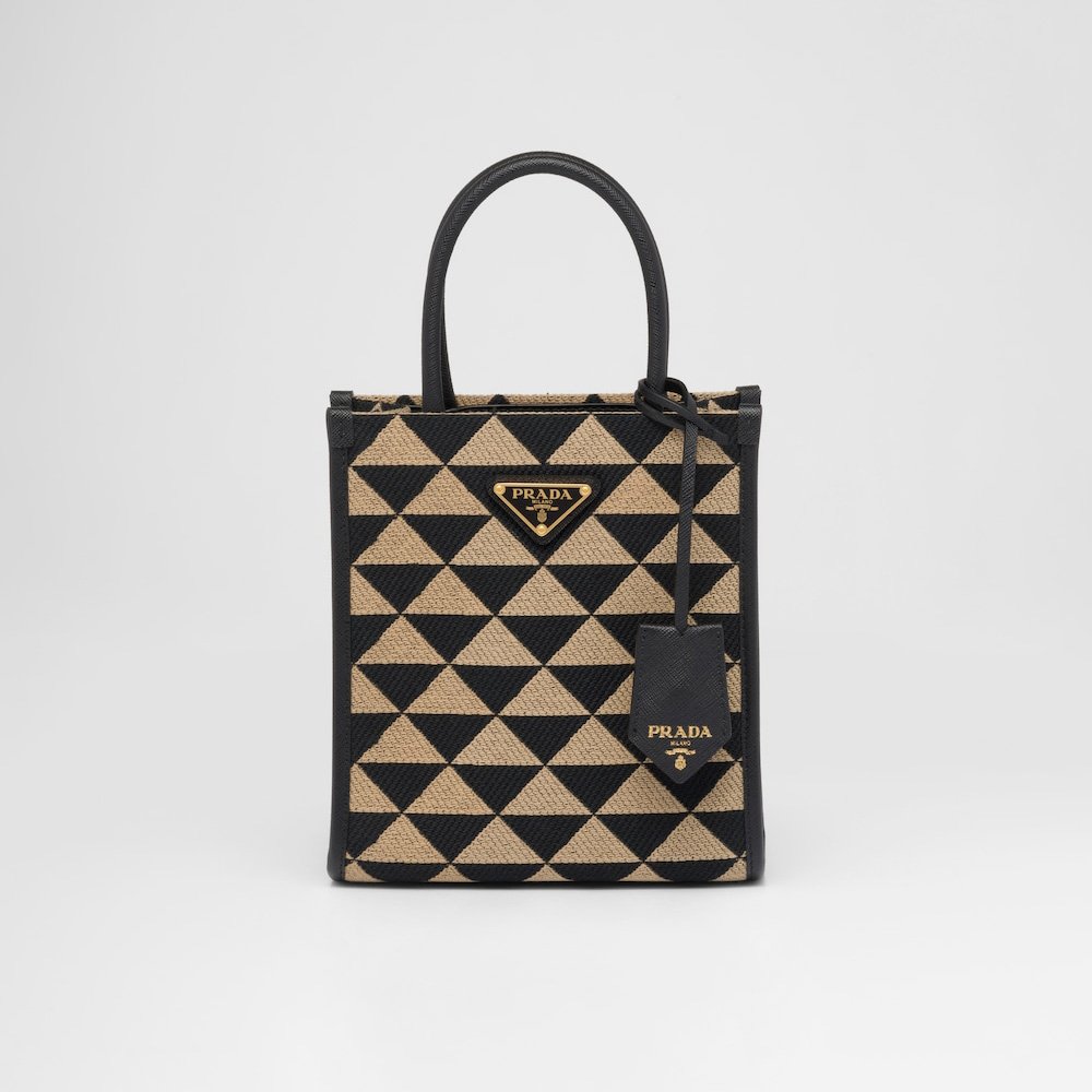 088af9cbde0a12871cc91c081b648962.jpg Symbole embroidered fabric mini bag - Image 1