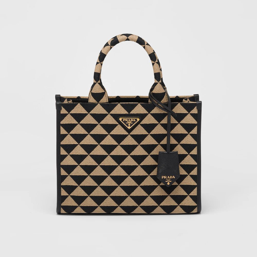0def8edba6f522ad70a7db571bd11d77.jpeg Small Symbole embroidered fabric handbag - Image 1