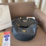 Arqué small leather shoulder bag