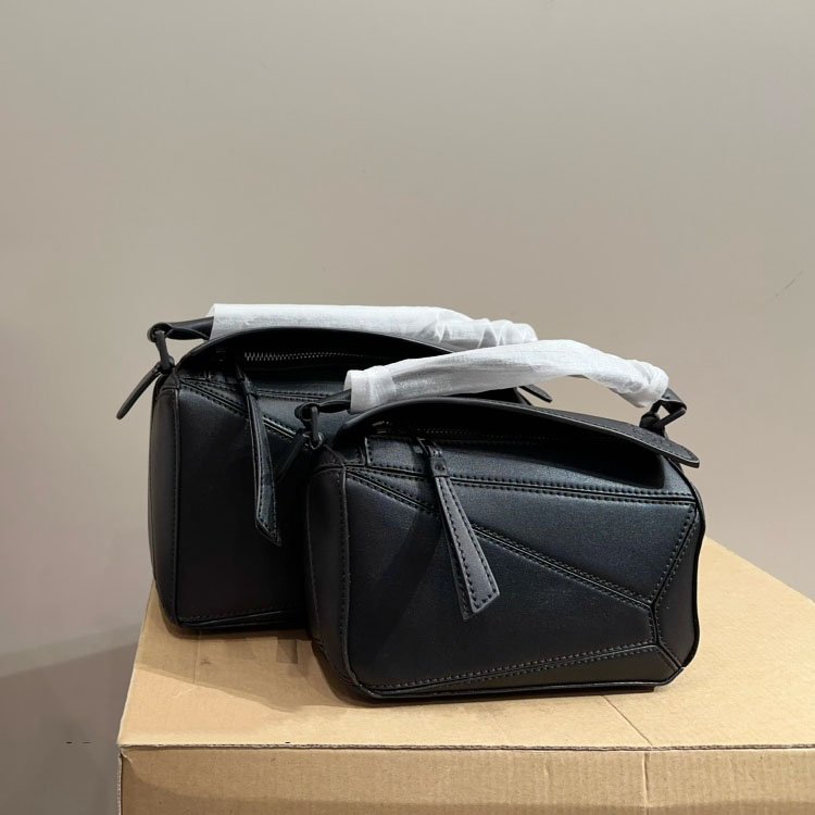 632b81af0753e2d318ad7d3115e987c0-1.jpeg Puzzle bag in soft grained calfskin - Image 1